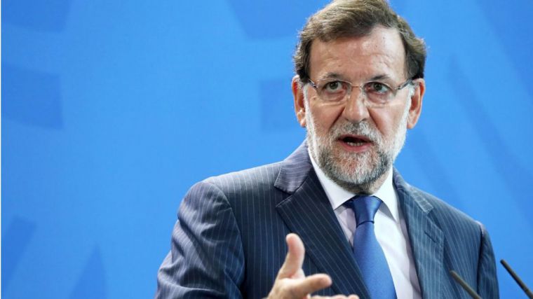 Rajoy: entre santos y difuntos
