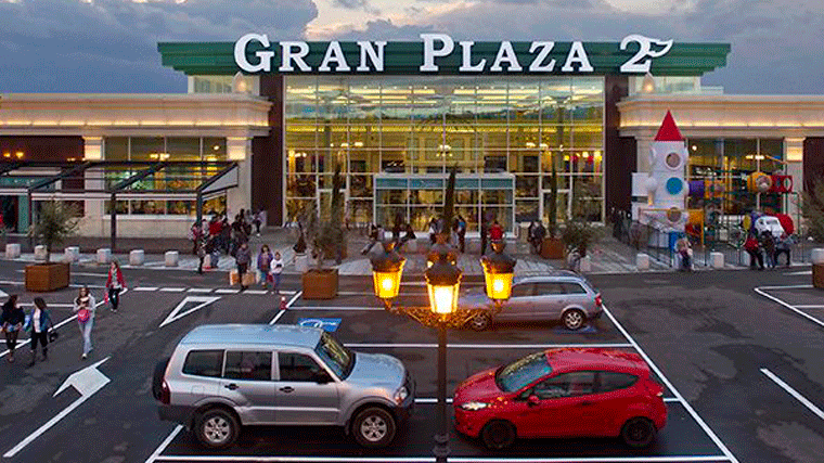 Un área comercial, exluida de las restricciones de la zona básica donde se ubica