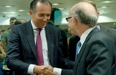 Madrid pide a Montoro que asuma los intereses de su deuda de 2012-13 y 14